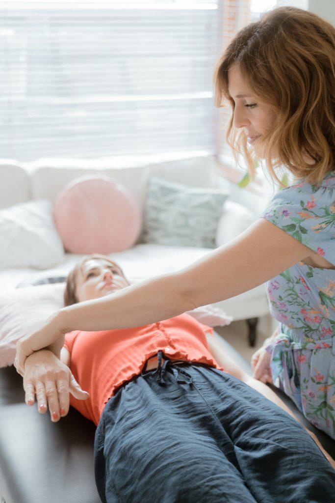 Systematic Kinesiologist applying muscle testing to access the body’s innate wisdom, allowing clear yes-or-no responses to guide holistic care.